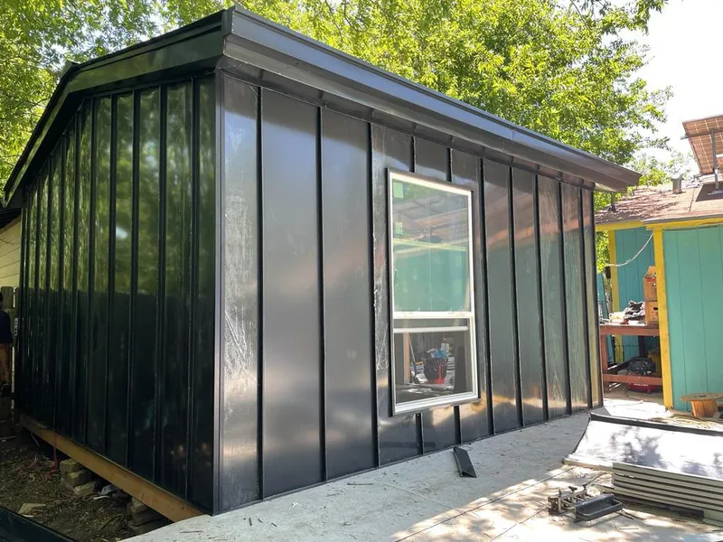 Black standing seam metal wall panels for Roof Inspection in Republic