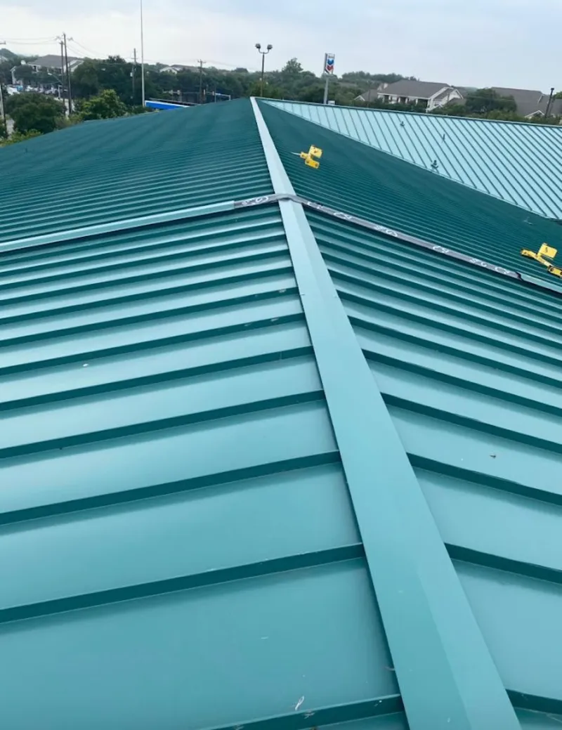 Green commercial metal roof ridge and valley for Metal Roof Repair in Republic
